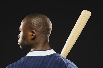 African American man holding baseball bat