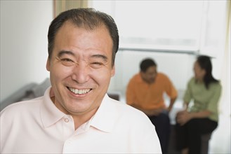 Chinese man laughing