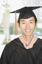 Chinese graduate in cap and gown