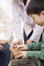 Chinese boy using abacus