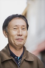 Chinese man smiling