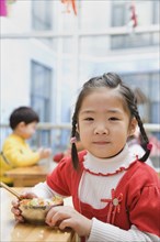 Chinese girl eating lunch