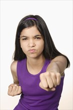 Hispanic girl in fighting stance