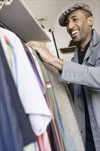 African American man shopping for clothing