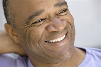 Smiling mixed race man