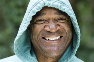 Smiling African American man in hoody