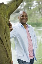 Smiling African American man in park