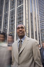 African American businessman in urban scene
