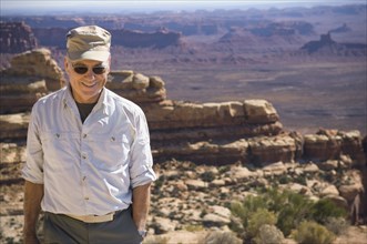 Senior man in front of desert landscape