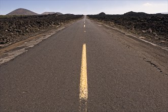 Highway through barren landscape