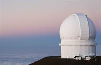 Observatory on hilltop over ocean