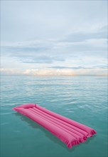 Inflatable raft floating in tropical water