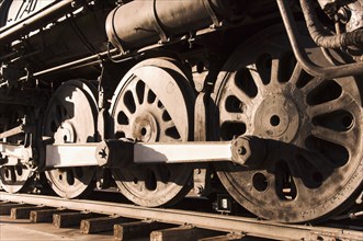 Close up of train wheels on tracks