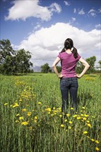 Mixed Race woman standing in field