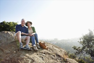 Caucasian couple hiking in remote area