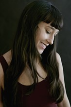 Mixed race woman smiling
