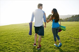 Couple walking together in park