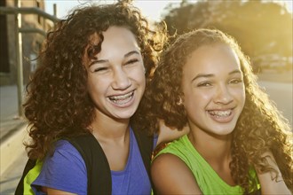 Mixed race girls smiling