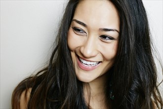 Mixed race woman smiling