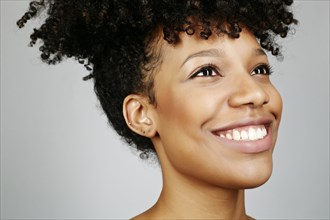 Close up of smiling face of mixed race woman