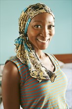 Smiling African American woman wearing headscarf
