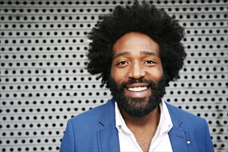 Mixed race businessman smiling