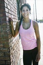 Mixed race woman smiling outdoors