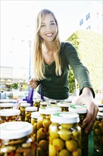 Caucasian woman shopping in farmers market