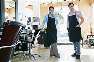 Hairdressers posing in hair salon