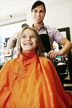 Hairdresser and customer in hair salon