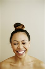 Portrait of laughing Asian woman