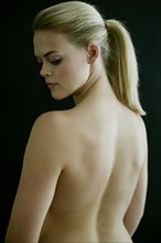 Rear view of naked Caucasian woman