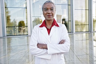 Portrait of smiling African American doctor outdoors at hospital