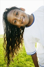 Portrait of smiling mixed race girl with long hair