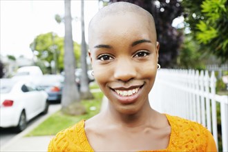 Portrait of bald smiling Black woman