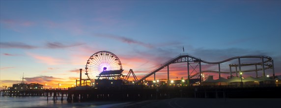 Amusement park on waterfront at night