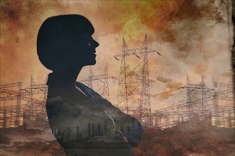 Double exposure of businesswoman and power lines