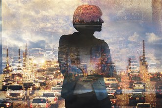 Double exposure of businesswoman and traffic