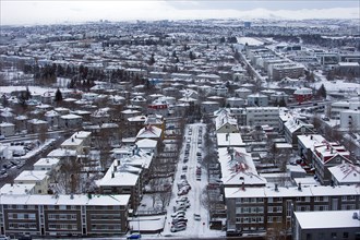 Aerial view of snowy cityscape