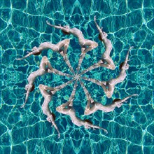 Multiple exposure of Caucasian woman swimming in spiral