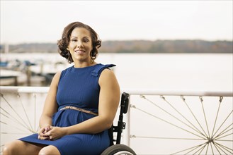 Disabled woman smiling in wheelchair