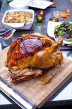 Roast turkey on cutting board