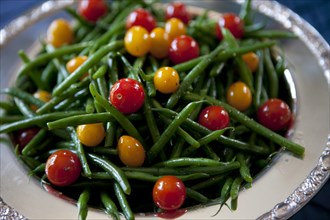 Close up of green beans and tomatoes