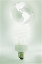 CFL light bulb shaped like globe