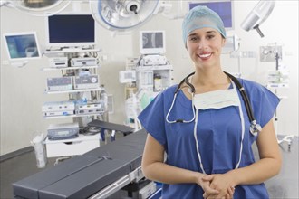 Mixed race surgeon in operating room