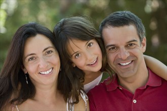 Smiling Hispanic family