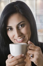 Turkish woman drinking coffee