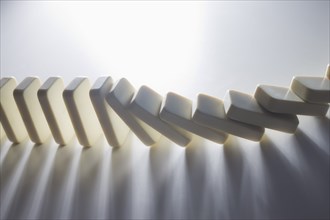 Close up of falling dominoes