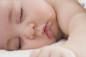Close up of Hispanic baby boy's sleeping face