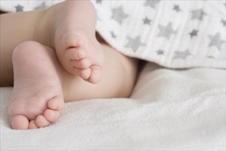 Close up of Hispanic baby boy's feet
